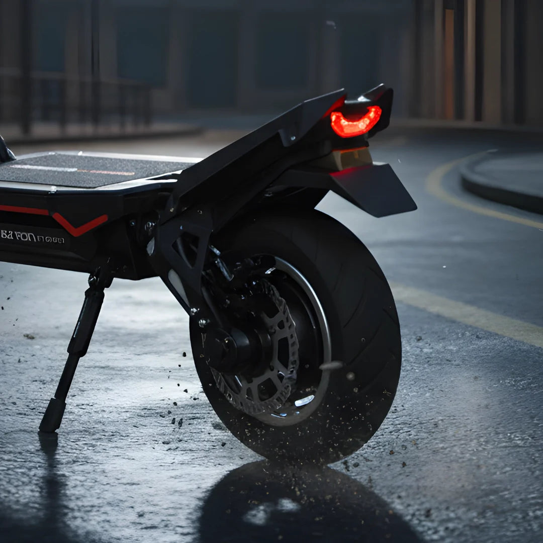 Electric scooter Dualtron Storm NEW – rear wheel and tail light splashing water