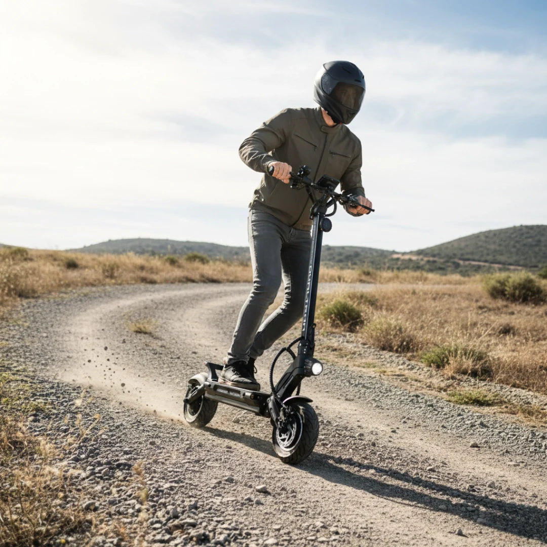 Electric scooter Dualtron Victor Limited – rider on dirt path