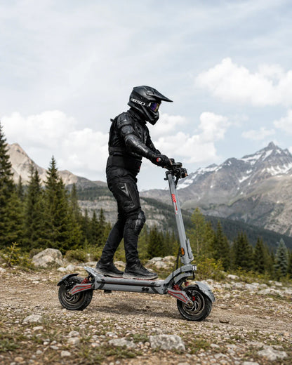 Electric scooter ECO Speed 10X V2 – rider on scooter in mountain landscape