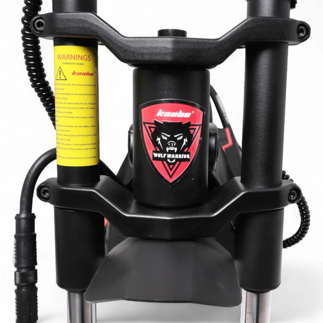 Electric scooter Kaabo Wolf Warrior 11 MAX – front suspension and warning label