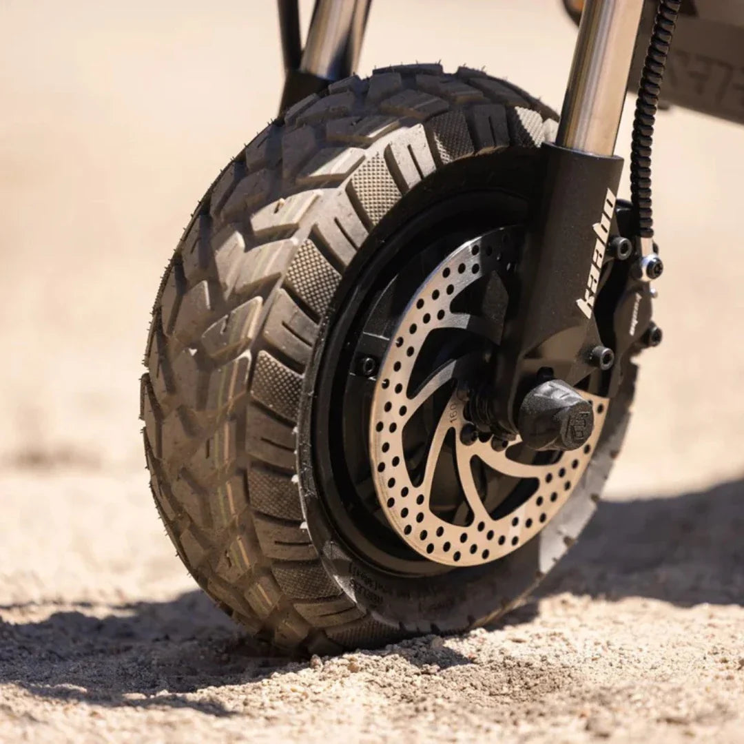 Electric scooter Kaabo Wolf Warrior 11 MAX – front wheel, tire tread, and disc brake