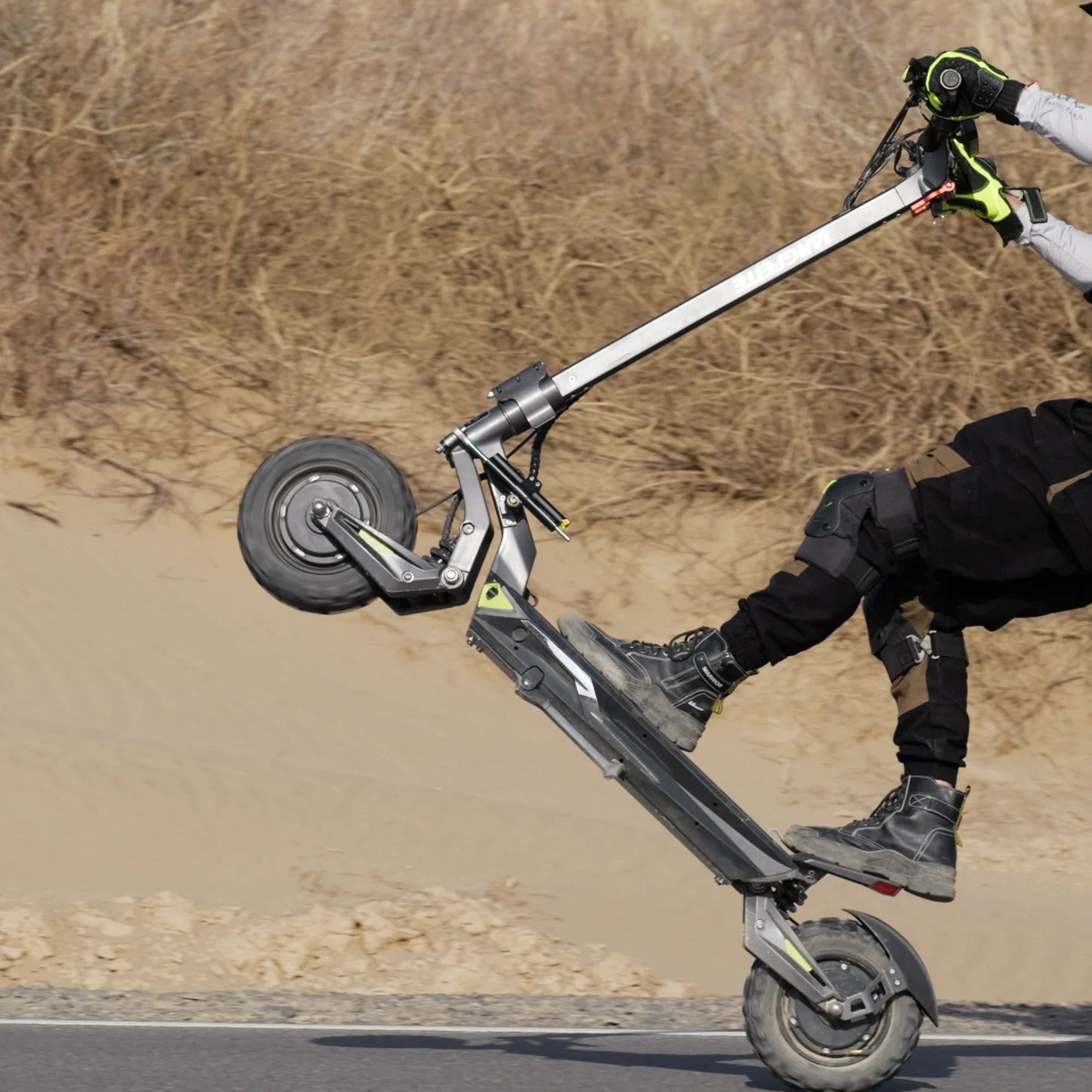 Electric scooter Langfeite C1 2026 – rider performing a wheelie on road