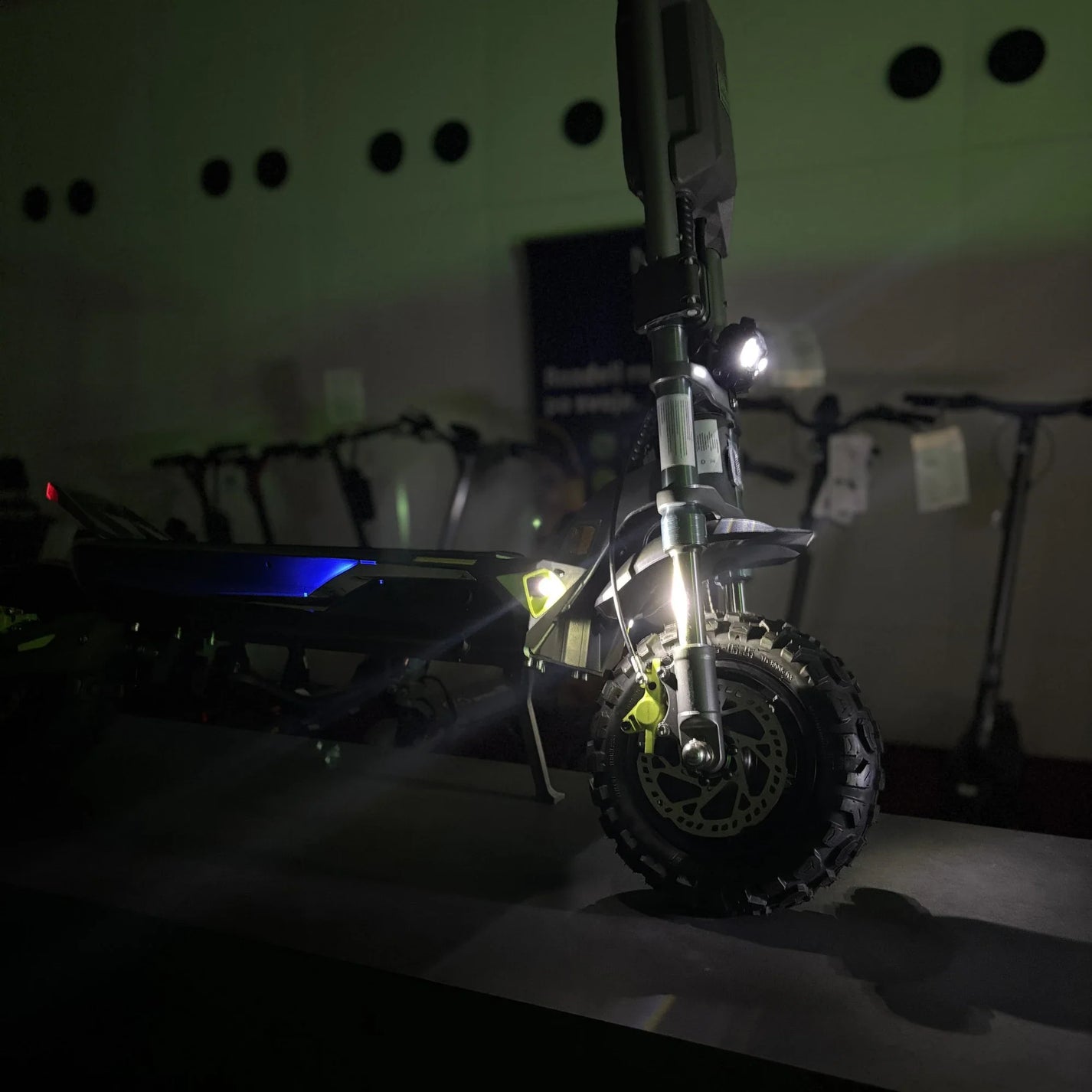 Electric scooter Langfeite H1 2026 – front wheel and headlight in darkness
