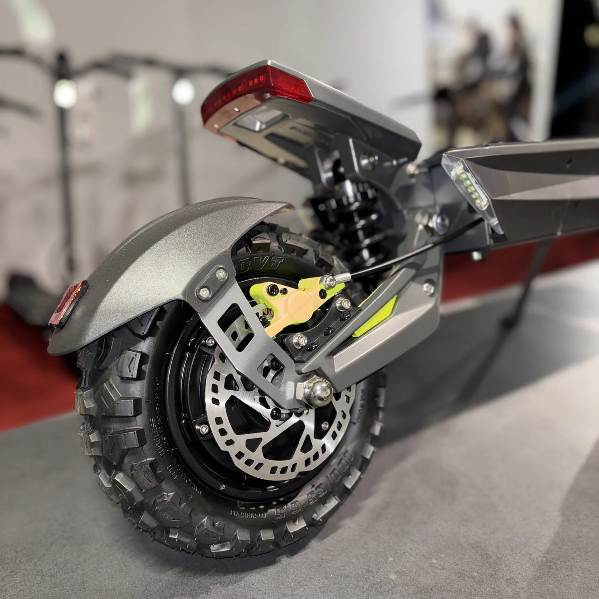 Electric scooter Langfeite H1 2026 – rear wheel, suspension, and brake close-up