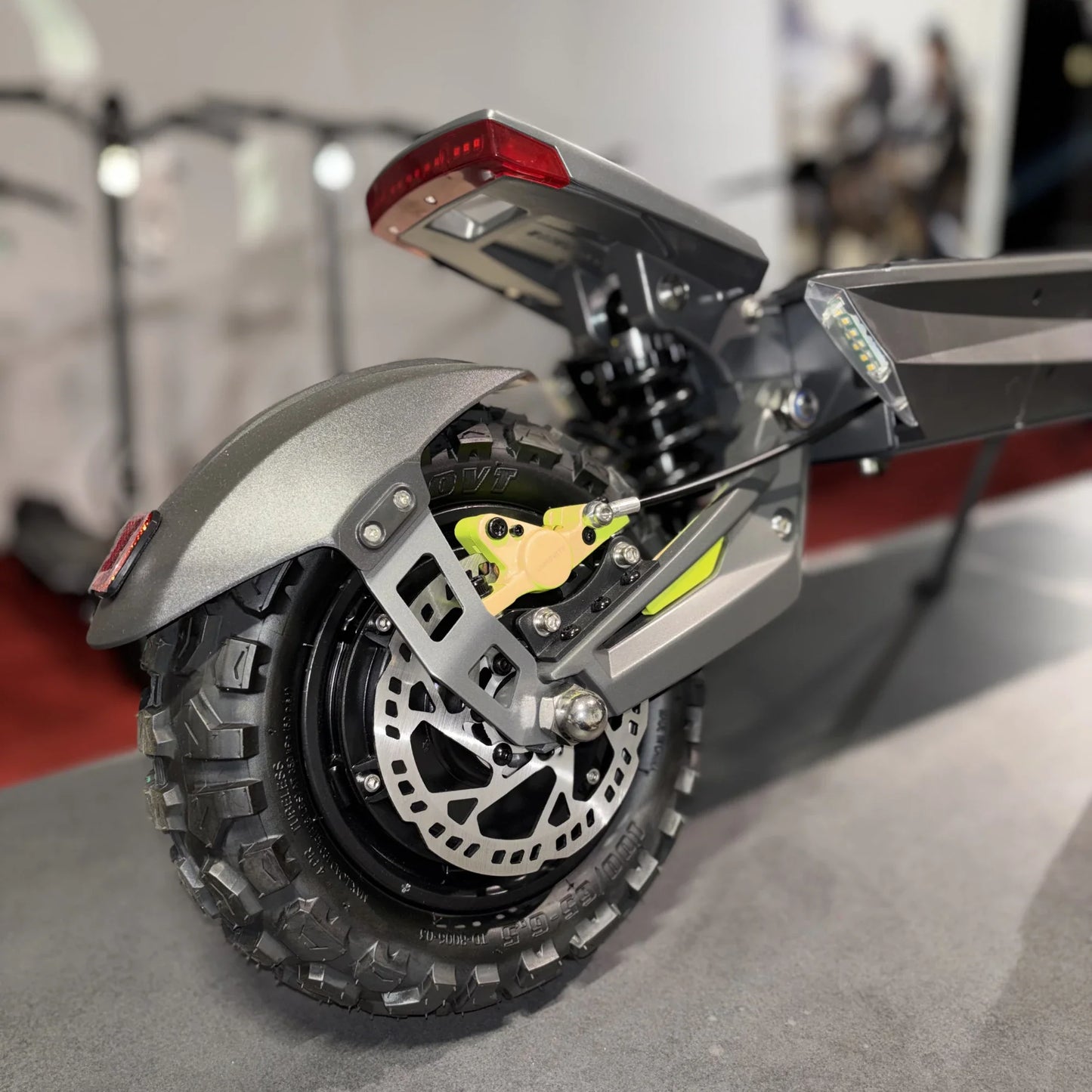 Electric scooter Langfeite H1 2026 – rear wheel, suspension, and brake close-up