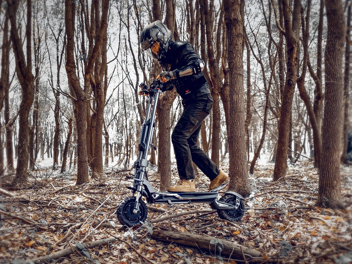Electric scooter Langfeite H1 2026 – person riding through a forest
