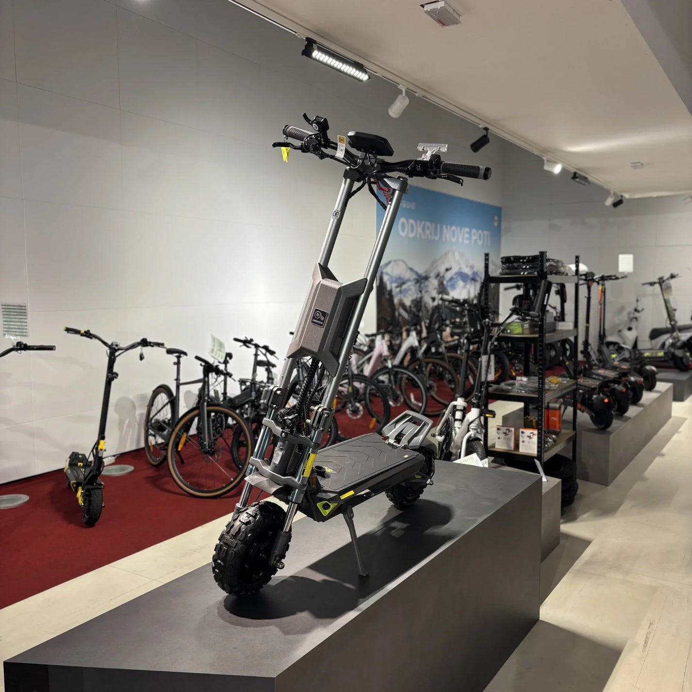 Electric scooter Langfeite H1 2026 – front three-quarter view in showroom