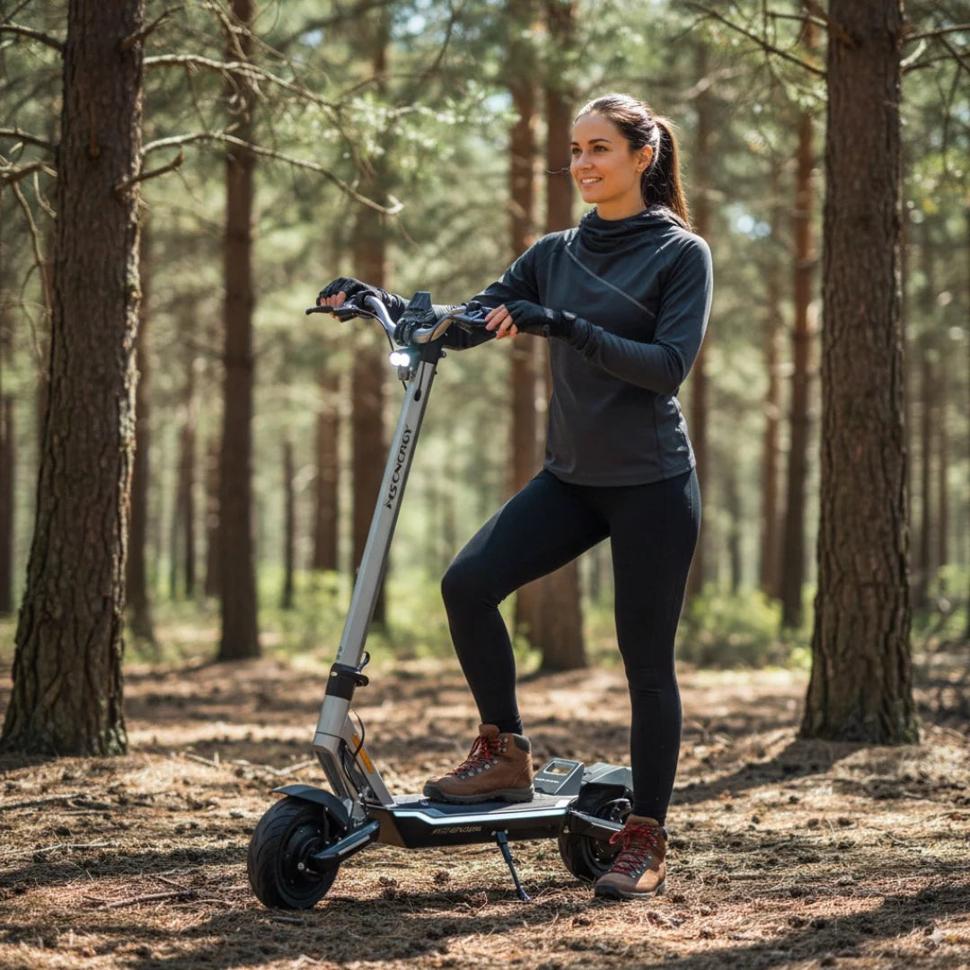 Electric scooter MS Energy Flare X – woman riding in forest