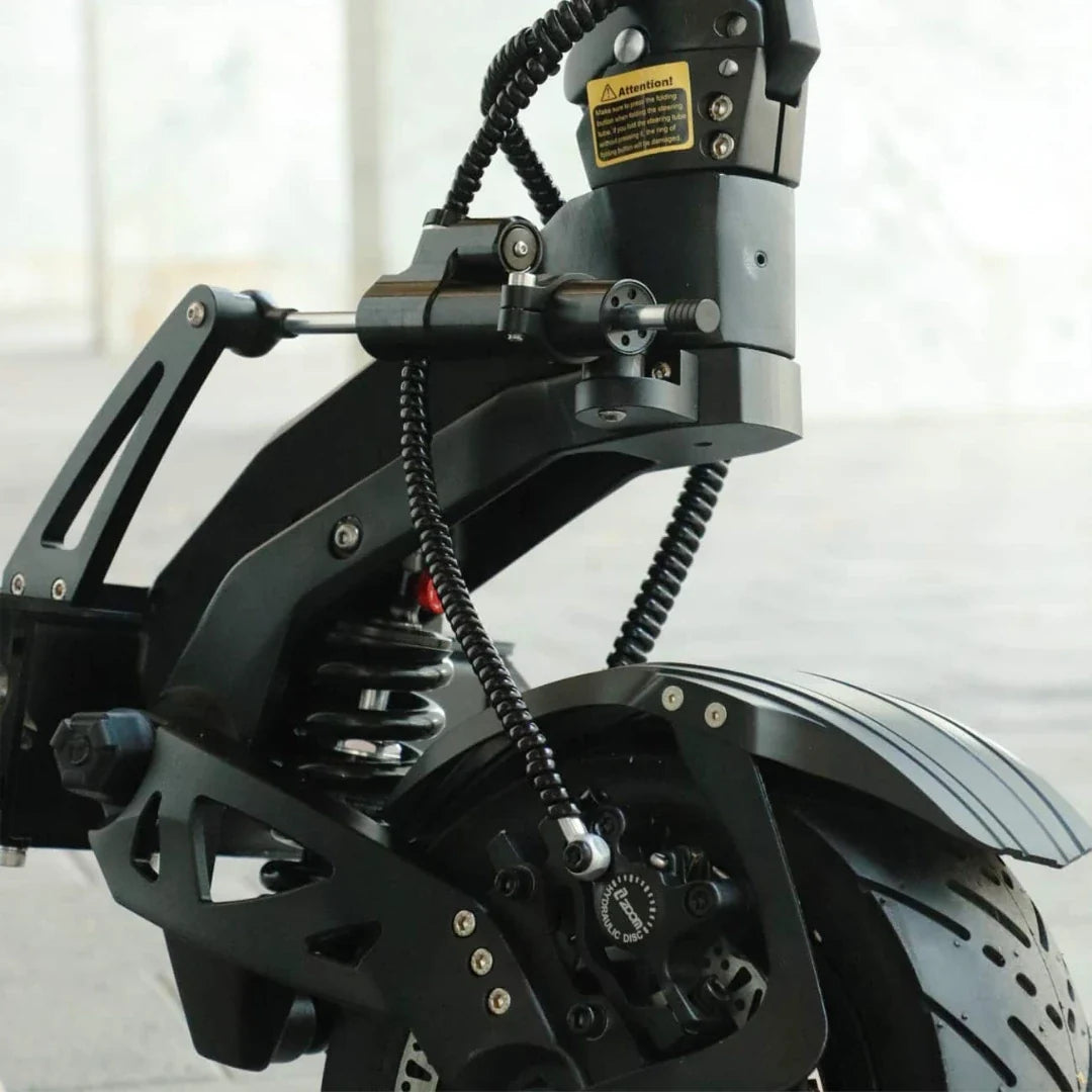 Electric scooter Teverun Fighter 11+ 2026 – front suspension and brake detail