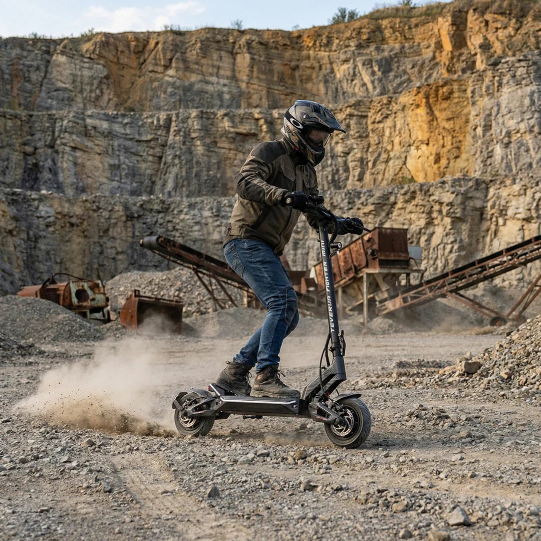Electric scooter Teverun Fighter Mini PRO 2026 – rider on dirt track