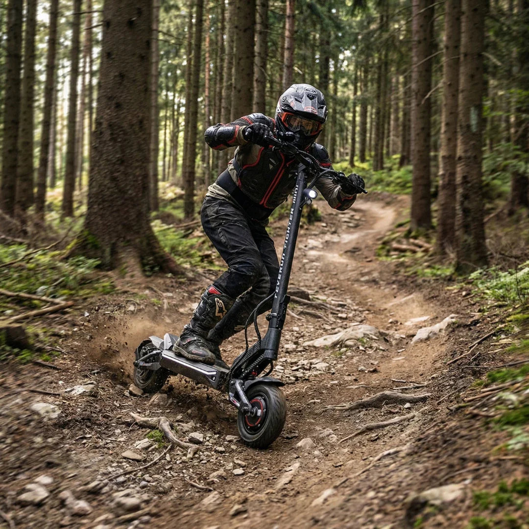 Electric scooter Teverun Fighter Mini PRO 2026 – rider on forest dirt track