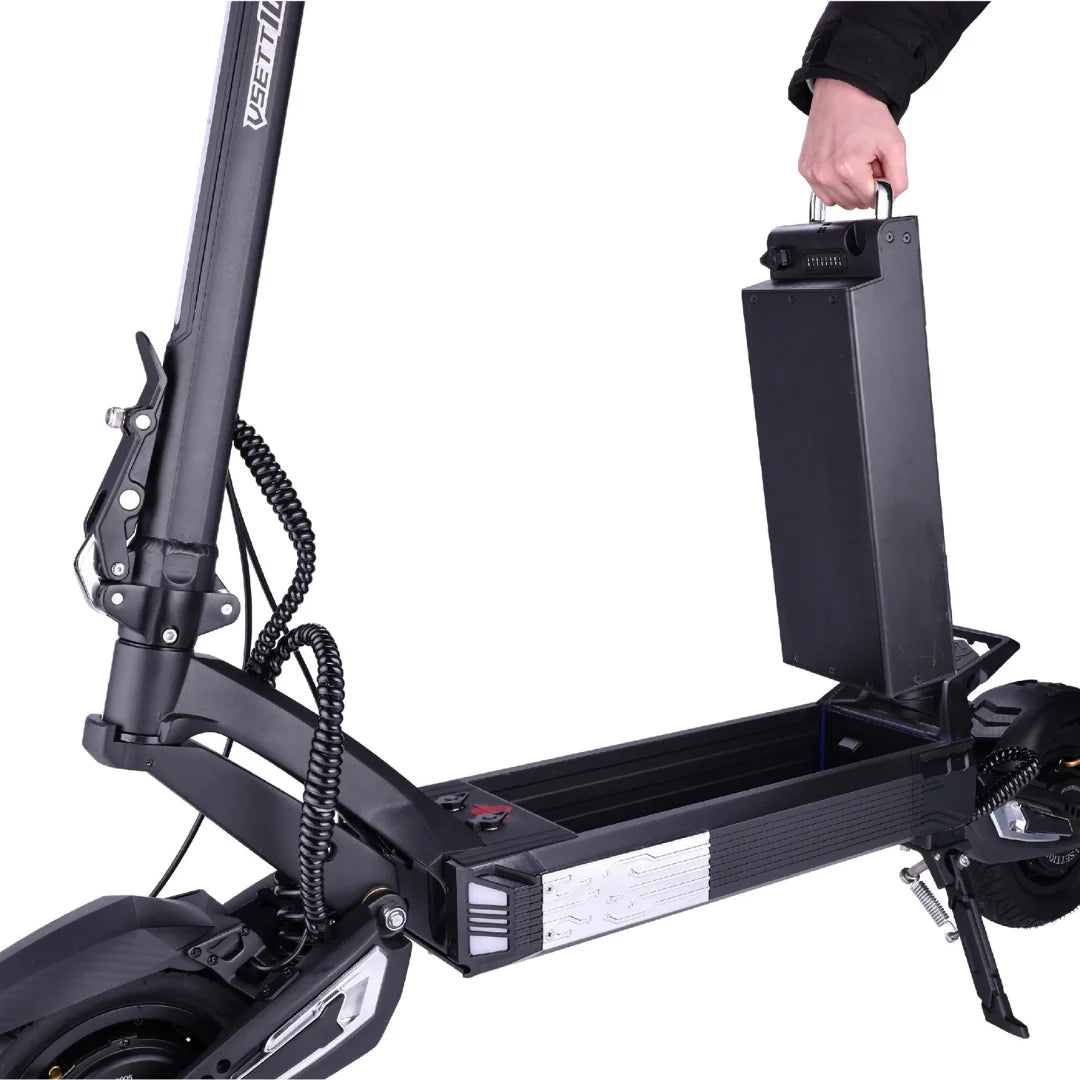 Electric scooter VSETT 10 APEX – hand removing battery from deck