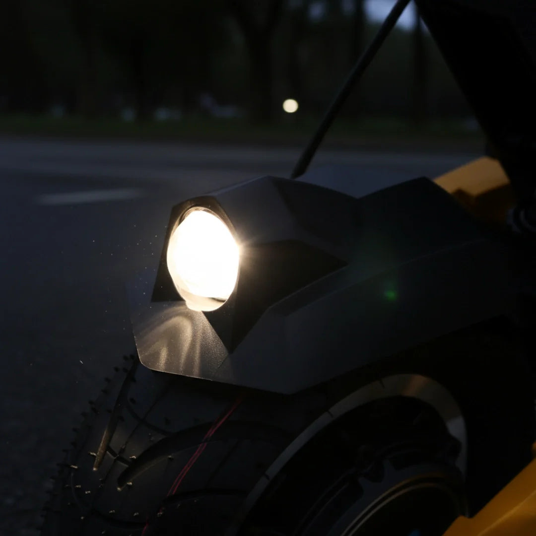 Electric scooter VSETT 10+ Super – front headlight illuminated at night