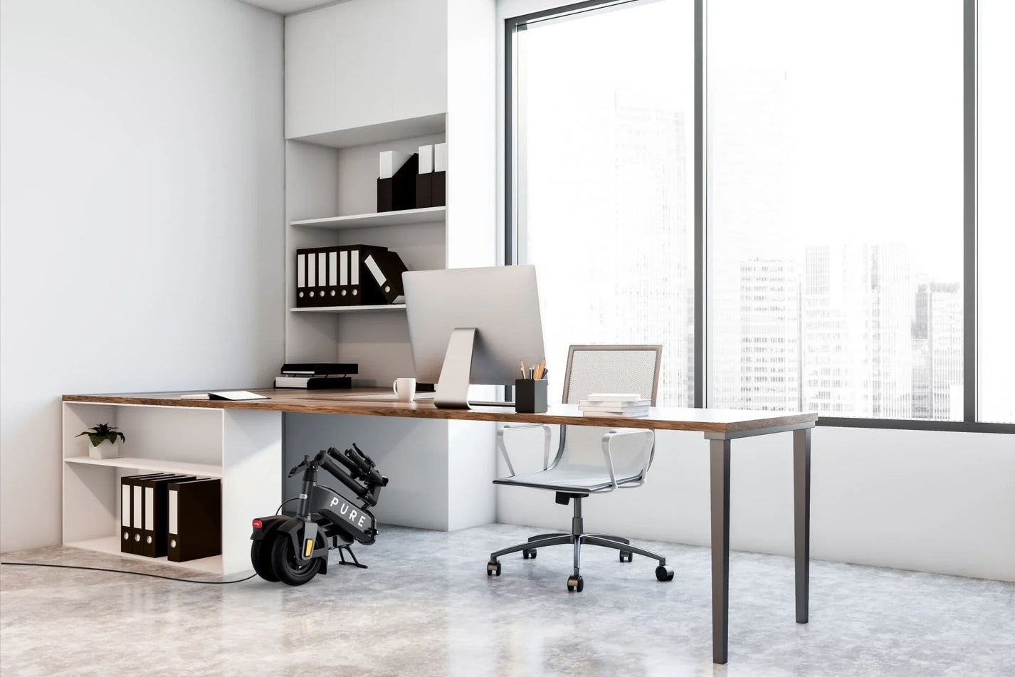 Electric scooter Pure FLEX – folded, stored under office desk