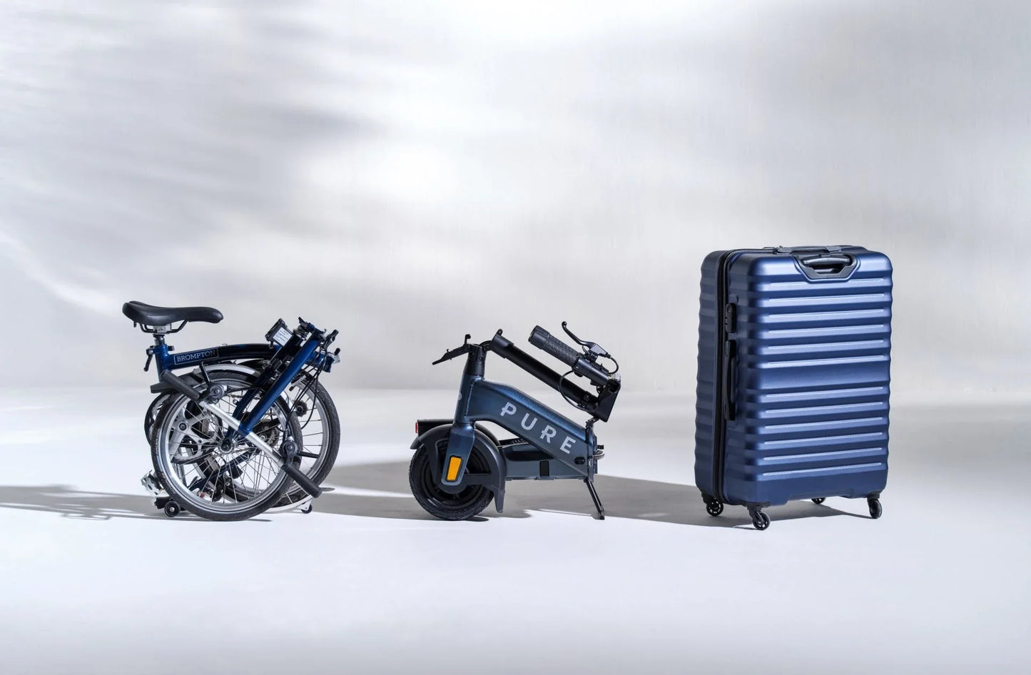Electric scooter Pure FLEX – folded scooter, folded bike, and suitcase comparison