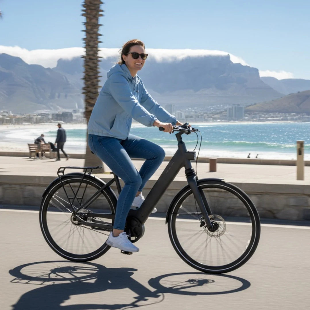 Electric bicycle MS Energy C300 – woman riding by beach