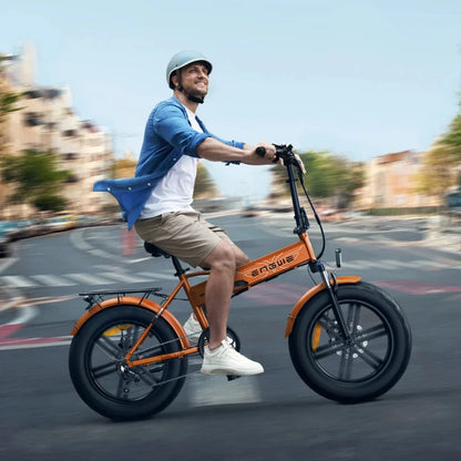 A man rides the electric bike Engwe EP 2 Boost on a city street, smiling as he enjoys the ride
