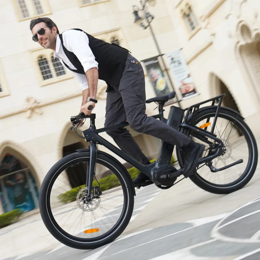 Electric Bike Engwe P275 Pro, sleek design, rider in casual attire, stylish urban backdrop, captures motion.