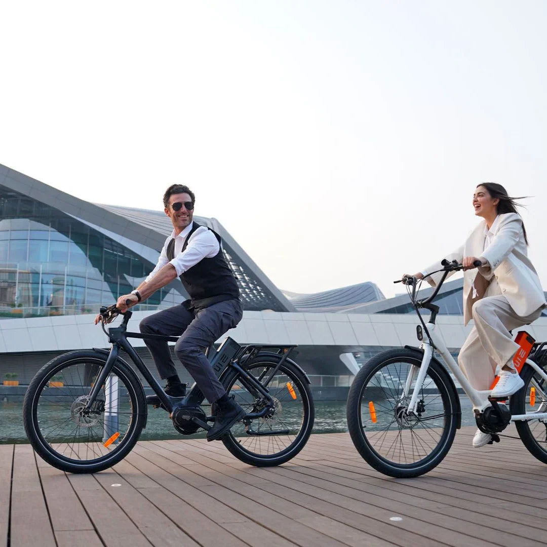 Electric bicycle Engwe P275 Pro – man and woman riding bikes outdoors