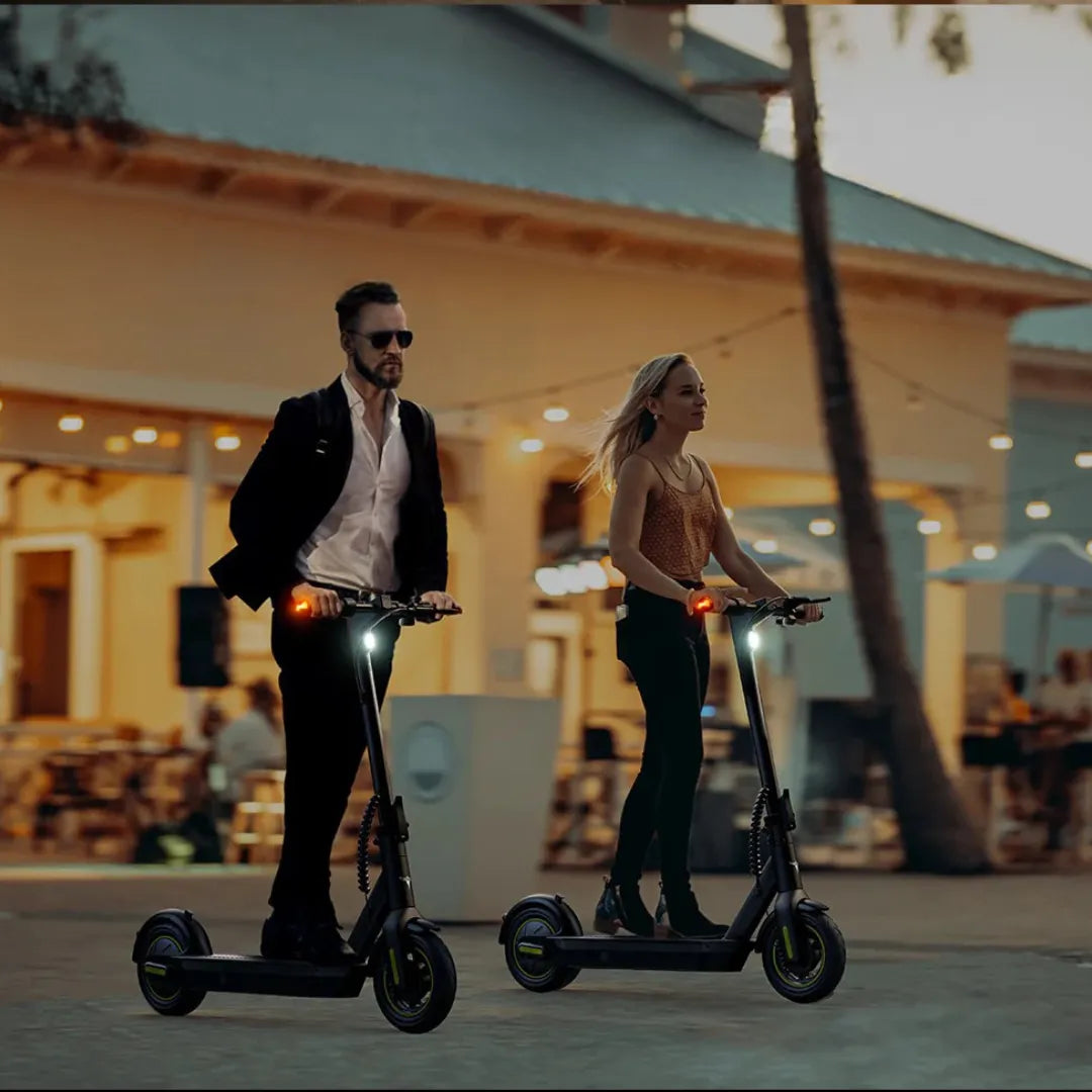 Electric Scooter Engwe Y10, stylish design featuring two riders in casual evening attire, sleek and modern.