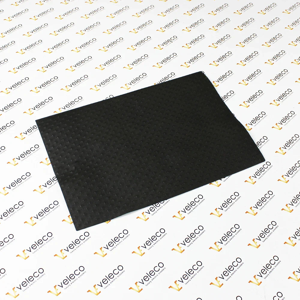 Rubber Battery Cover for Veleco Faster – black rubber mat, top view