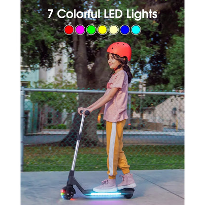 The child rides the Gyroor H30 electric scooter, which displays 7 colorful LED lights