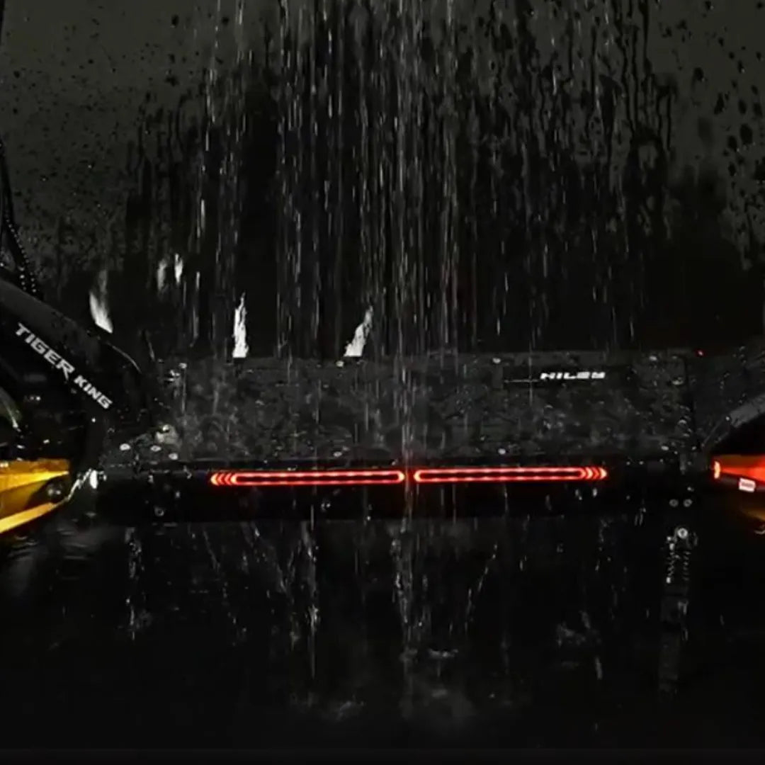 Electric Scooter Hiley Tiger King features a sleek design, illuminated deck, and water resistance under heavy rain.