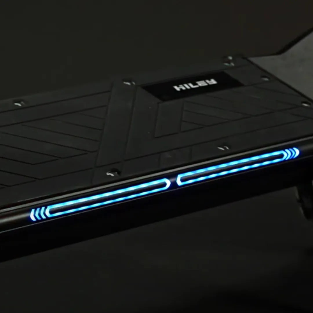 Electric Scooter Hiley Tiger King features a stylish deck with blue LED lighting and textured surface for grip.