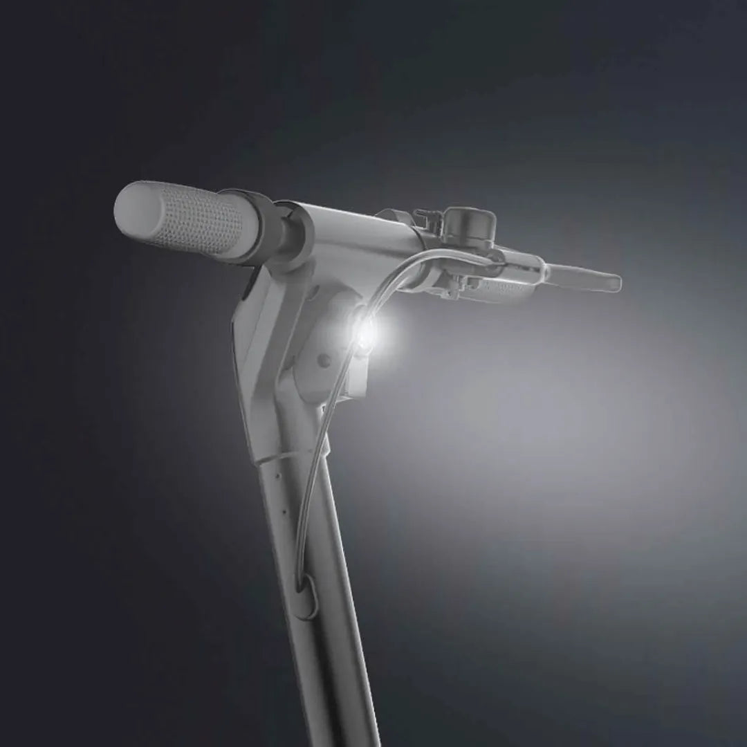 Electric scooter Joyor LiteGo – handlebar and front light illuminated close-up