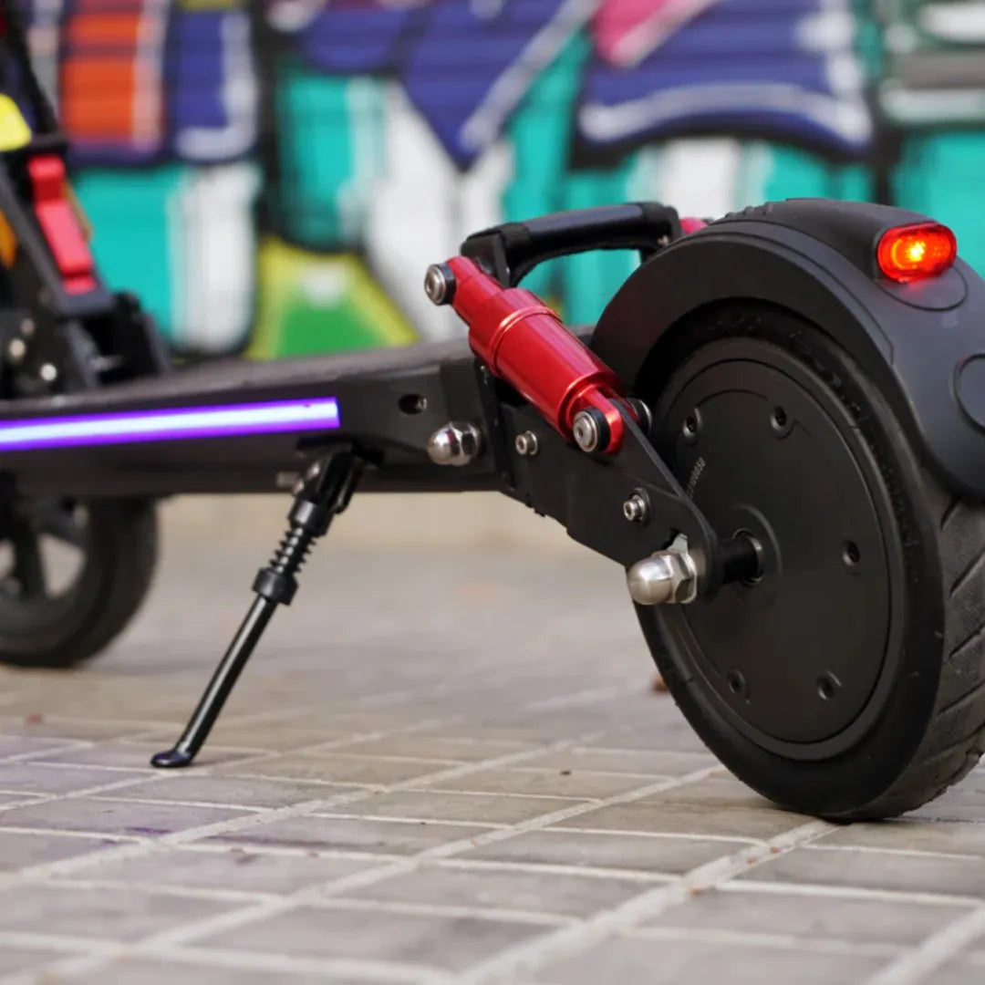 Electric Scooter Joyor G5 features a rear shock absorber, sturdy black wheel, and sleek design elements.