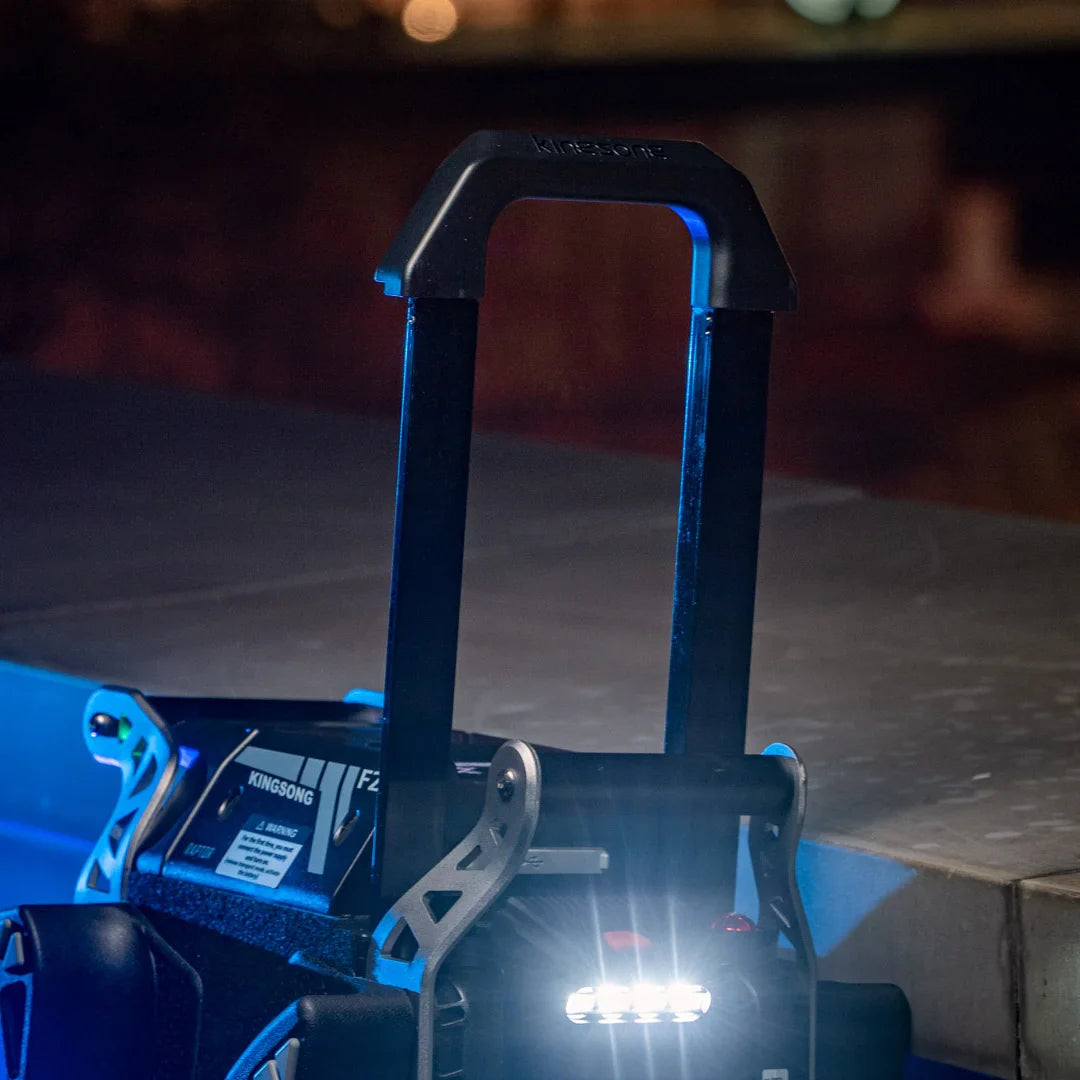 Electric Unicycle Kingsong F22 Pro features an ergonomic handle, bright lights, and a sleek design for convenience.