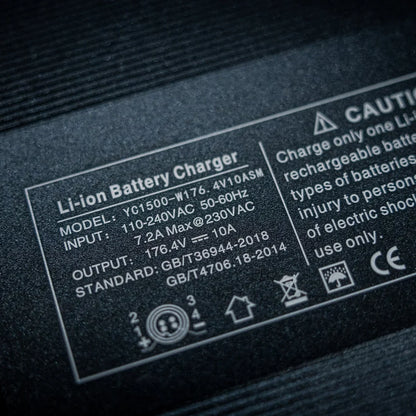 Electric Unicycle Kingsong F22 Pro, features a Li-ion battery charger with model and safety specifications.