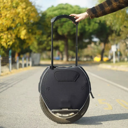 Electric Unicycle Kingsong 18xl features a sleek design, sturdy build, and a convenient retractable handle.