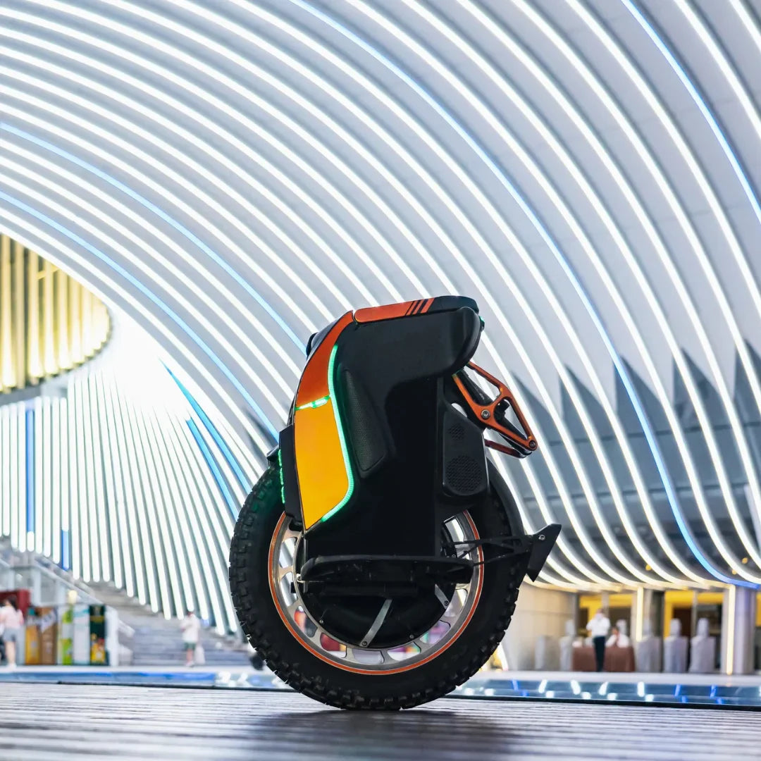 Electric Unicycle Kingsong S19 features vibrant lights, a sturdy design, and a rugged tire for stability.