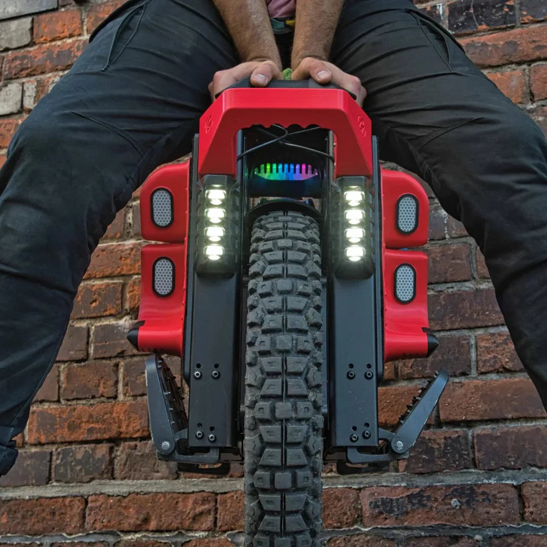 Electric unicycle KingSong S22 Pro – person riding, rear view