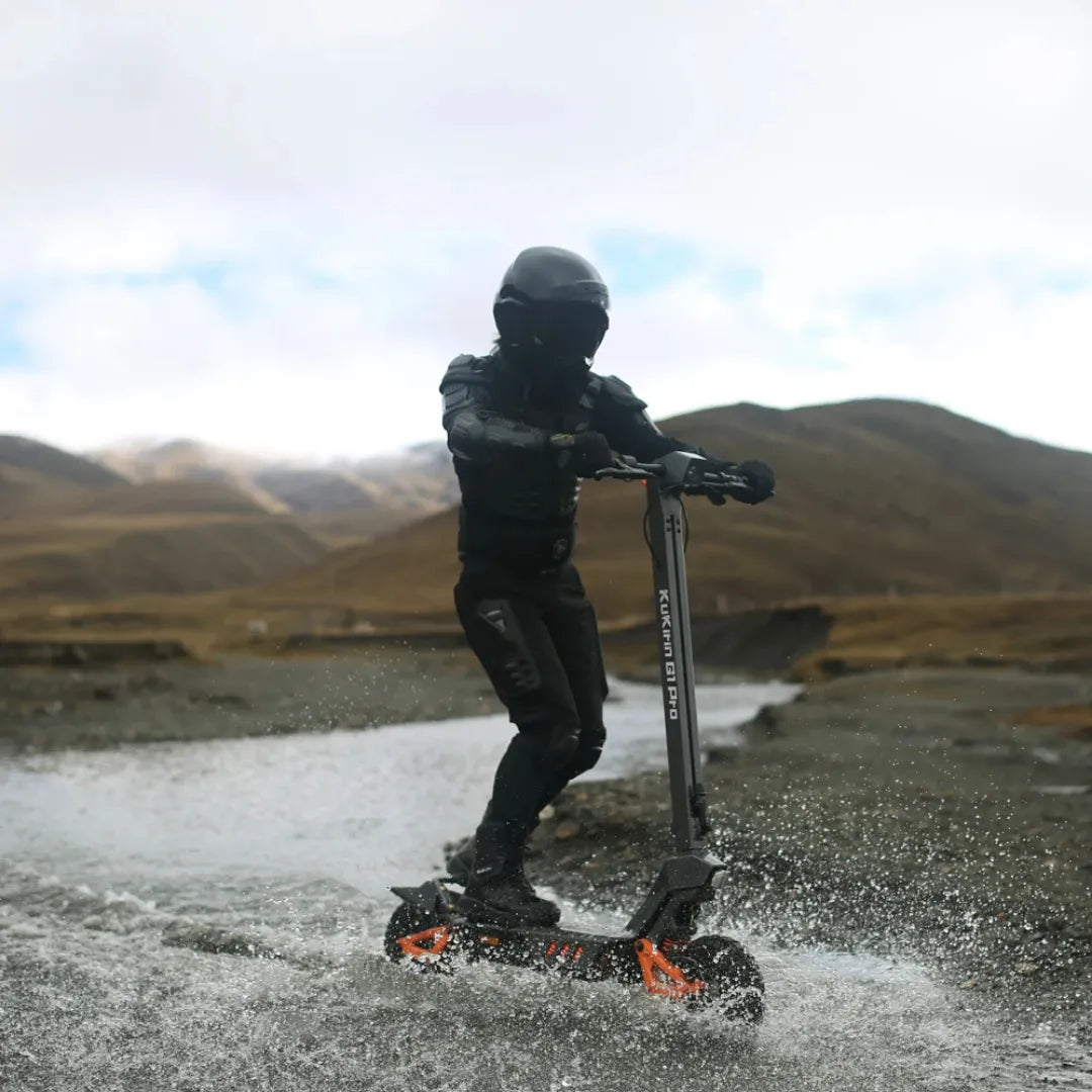 Electric Scooter Kukirin G1 Pro, a rugged electric scooter splashing through water, designed for adventure.