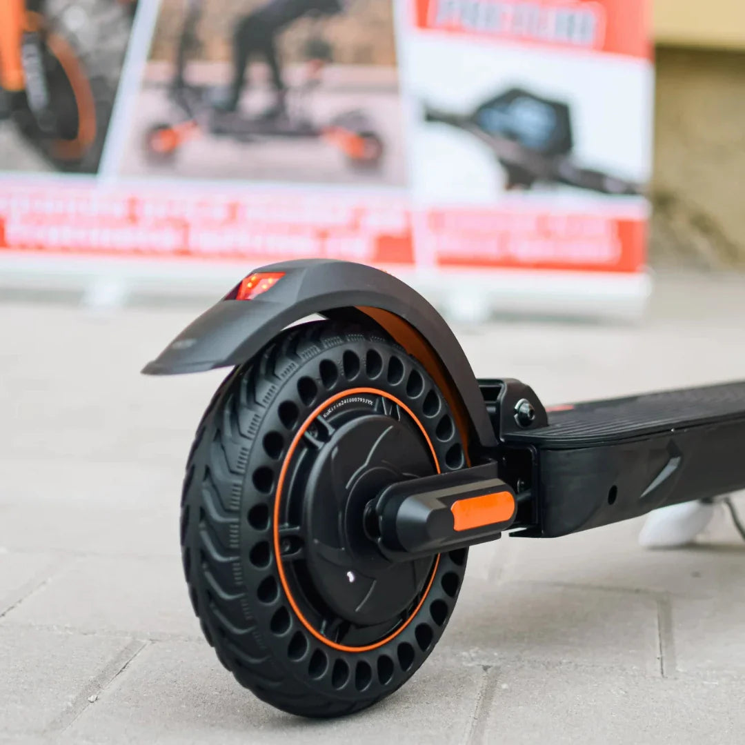 Close-up of the rear wheel of the Kukirin S1 Max electric scooter on the pavement