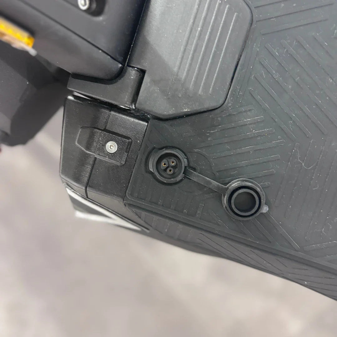 Electric Scooter Ms Energy Flare X Pro features a sleek design, showing a close-up of the charging port and details.