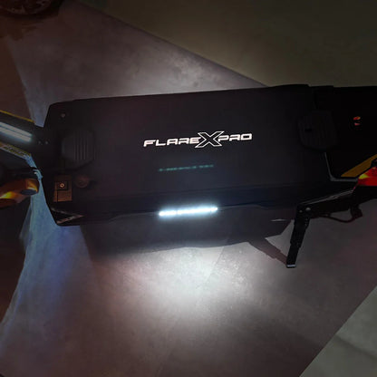 Electric Scooter Ms Energy Flare X Pro features a sleek black design with illuminated branding, ideal for night rides.