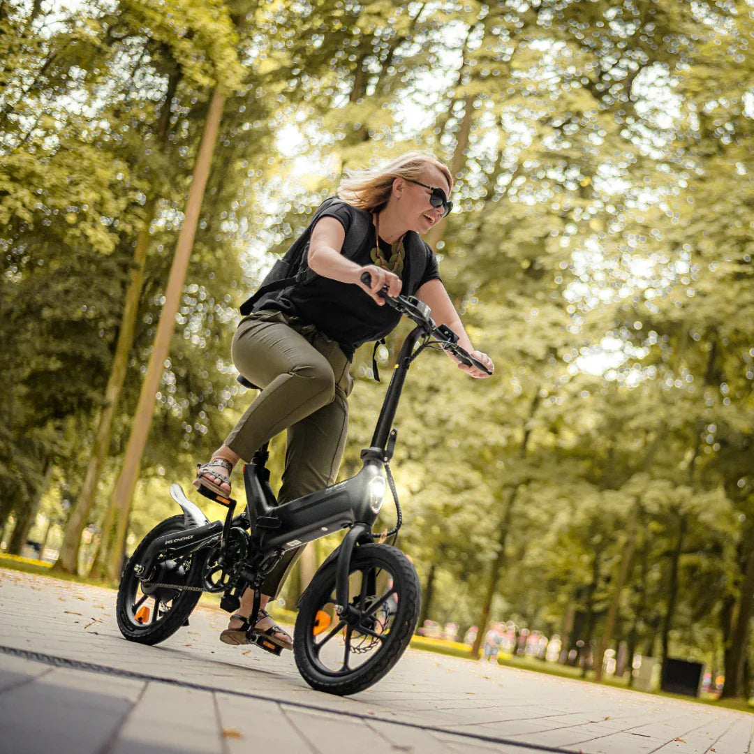 Electric bicycle MS Energy UrbanFold i6 – woman riding in park, front view