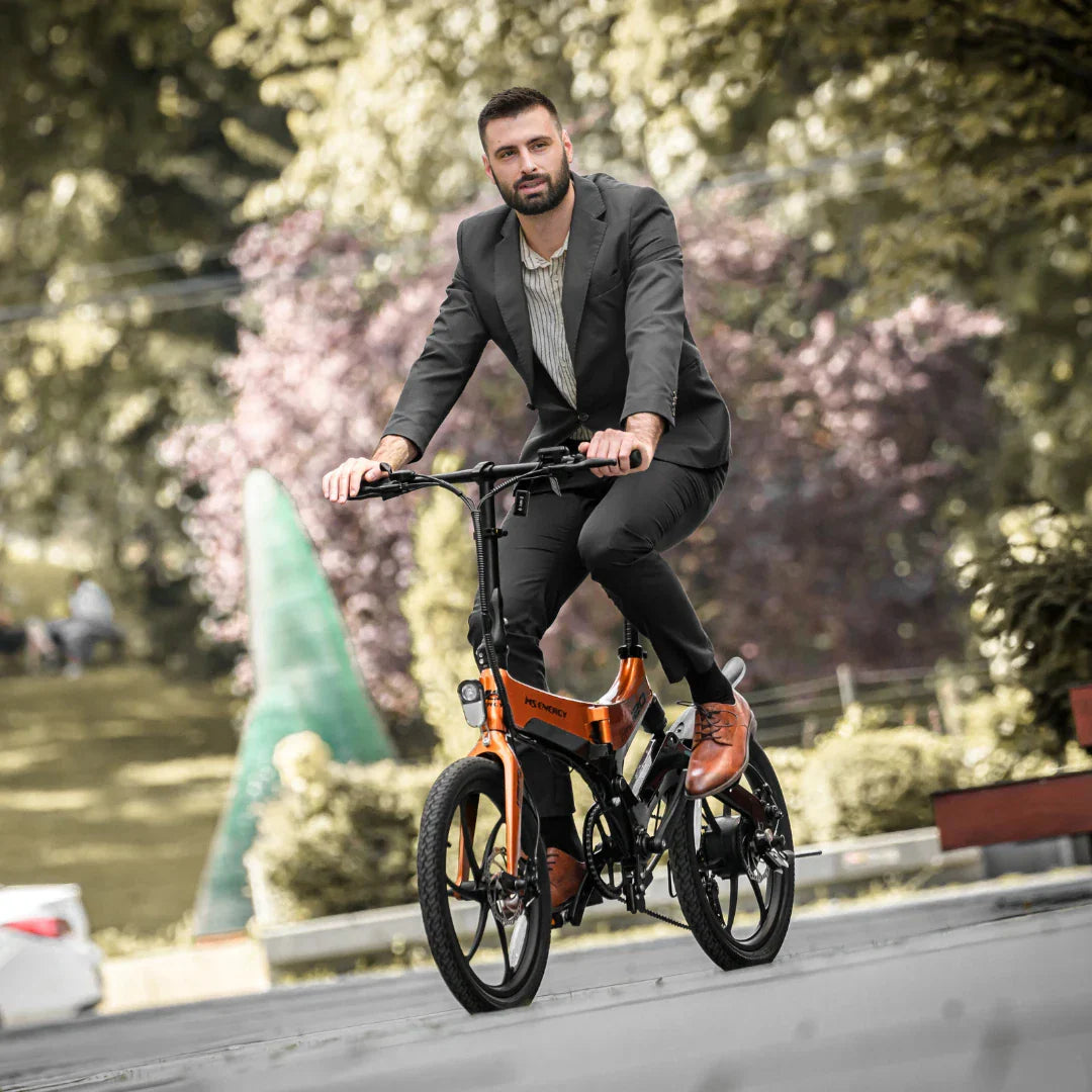 Electric bicycle MS Energy StreetFlex i20 – man riding, front view, uphill
