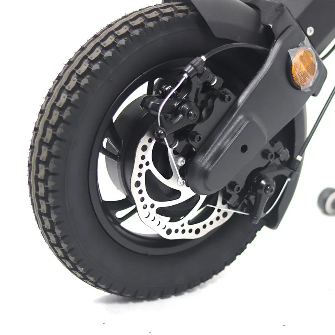 Electric Handbike Mijo Mt01 features a robust rear wheel with advanced disc brake system and durable tire.