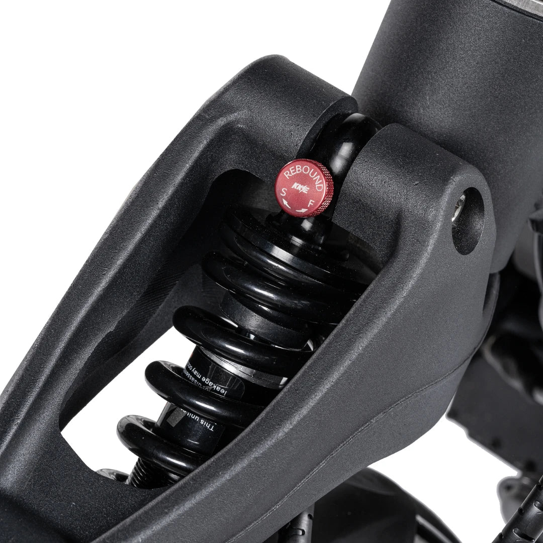 Close-up of the rebound adjustment feature on the suspension system of the electric scooter Nami Blast 2 Max