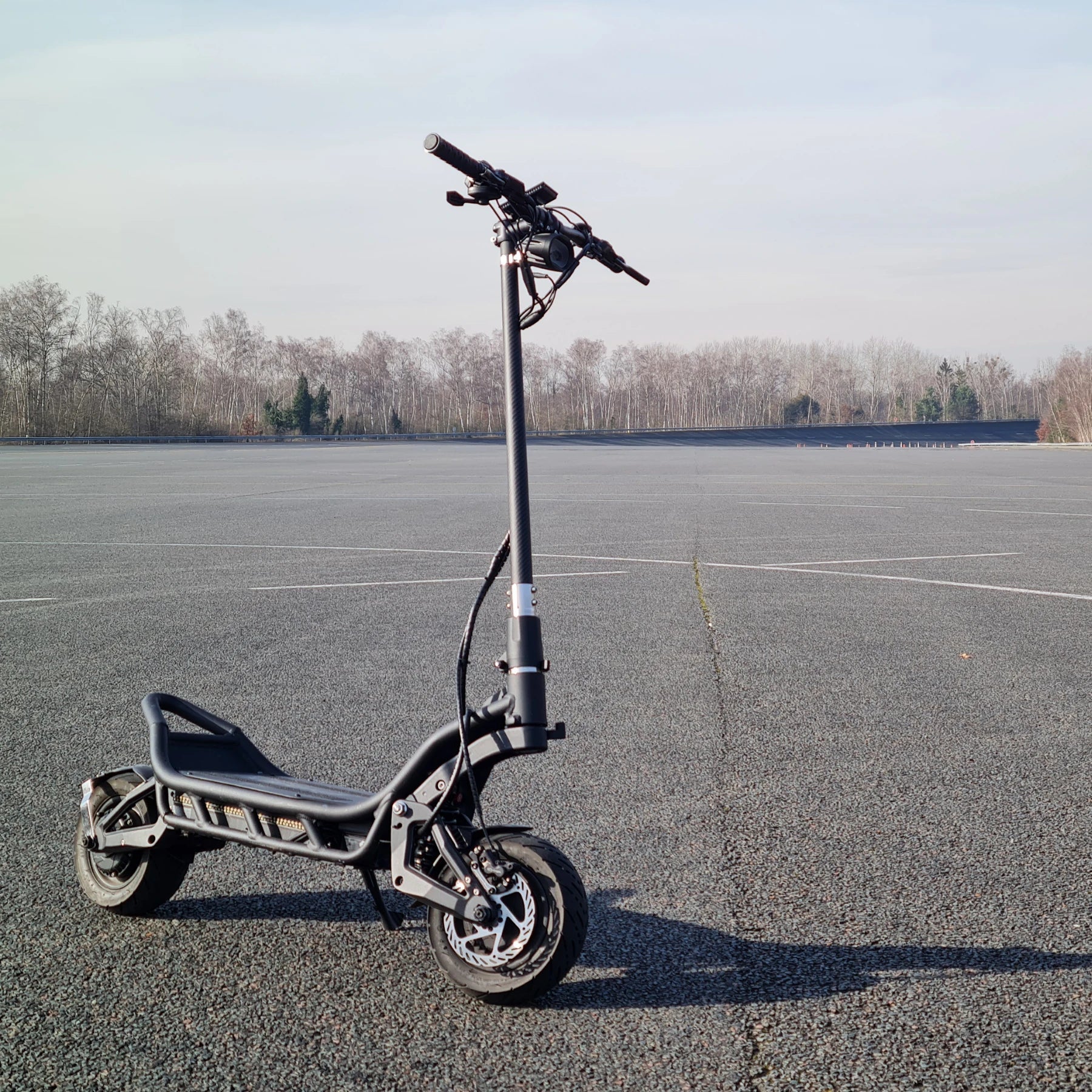 Electric Scooter Nami Burn E 3 Max, features a sturdy frame and wide tires for smooth rides on any terrain.