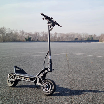 Electric Scooter Nami Burn E 3 Max, features a sturdy frame and wide tires for smooth rides on any terrain.