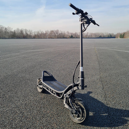 Electric Scooter Nami Burn E 3 Max features a sturdy frame, wide deck, and large wheels for stability and comfort.