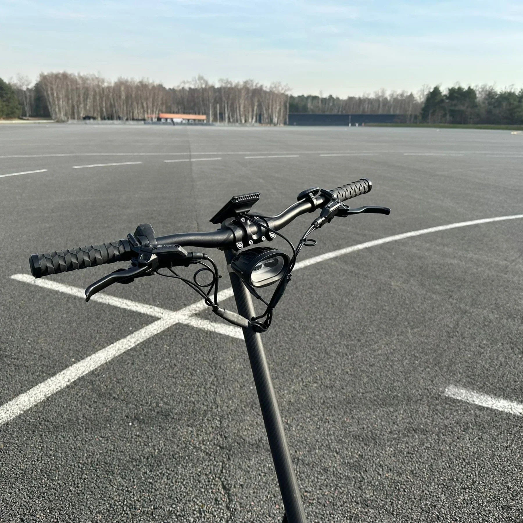 Electric Scooter Nami Burn E 3 Max features a sleek black handlebar with controls and a digital display.
