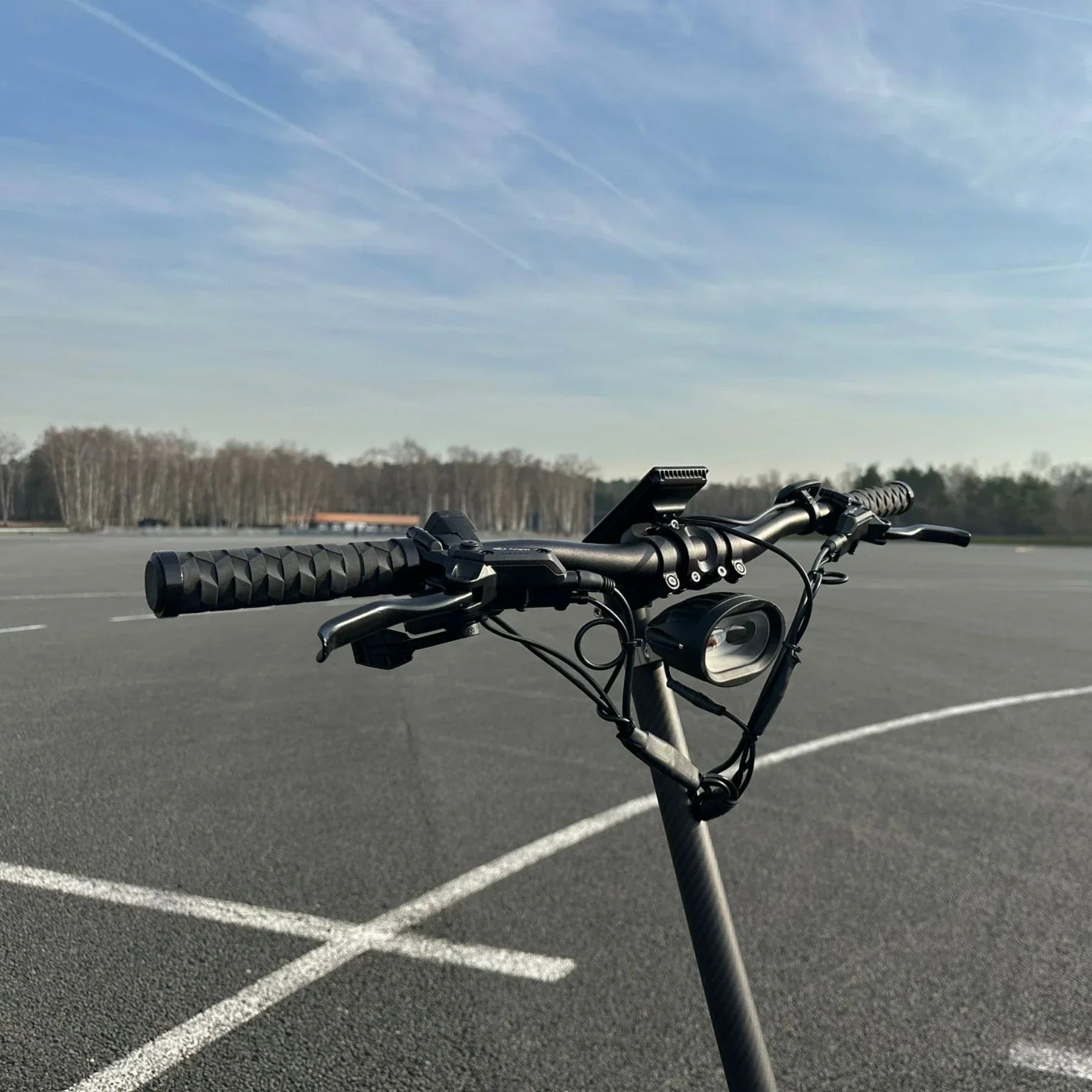 Electric Scooter Nami Burn E 3 Max, featuring sleek handlebars, textured grips, and a stylish design.