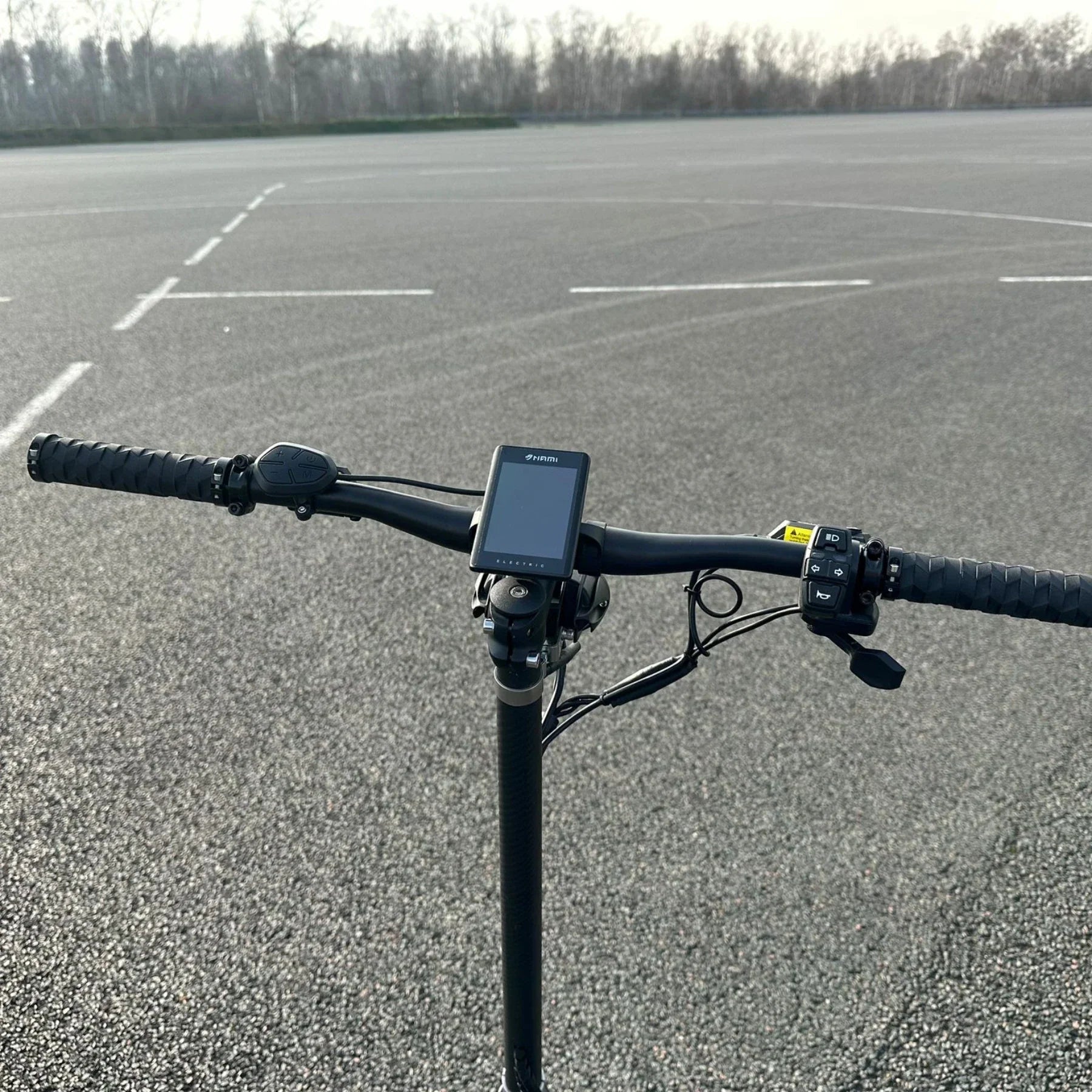 Electric Scooter Nami Burn E 3 Max features a sleek handlebar with an LCD display, responsive grips, and controls.