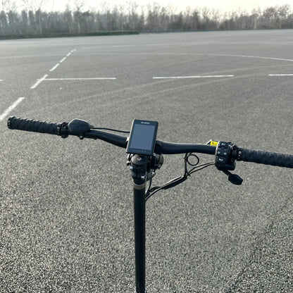 Electric Scooter Nami Burn E 3 Max features a sleek handlebar with an LCD display, responsive grips, and controls.